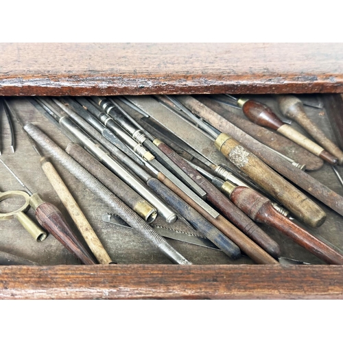 225 - WATCHMAKERS CABINET, 19th century mahogany with six graduated drawers, locking stiles and an impress... 