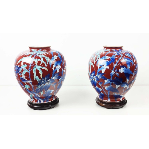 27 - JAPANESE KORANSHA VASES, a pair, with foliate decoration on stands, 35cm H. (2)