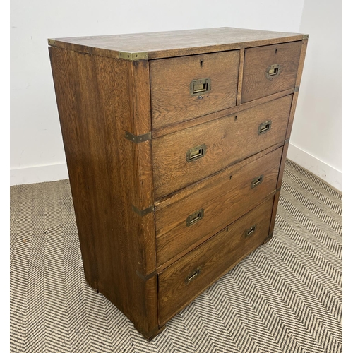 278 - CAMPAIGN CHEST, early 20th century oak, having two short and three long drawers with brass recessed ... 