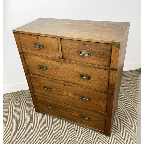 278 - CAMPAIGN CHEST, early 20th century oak, having two short and three long drawers with brass recessed ... 