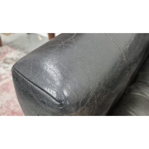 356 - SOFA, mid-20th century, black buttoned leather, 211cm W approx.