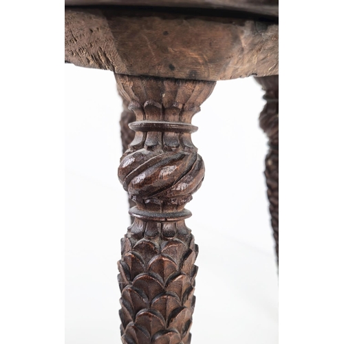 373 - MILKING CHAIR, early 20th century Indian hardwood and all over carved, 76cm H x 31cm W.