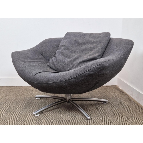 380 - GERARD VAN DEN BERG GIGI SWIVEL CHAIR, in dark grey upholstery, 68cm H x 110cm W x 80cm D.