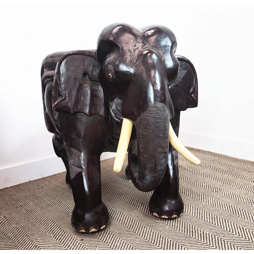 382 - ELEPHANT CHAIRS, a pair, Thai hand carved teak, 86cm H x 70cm. (2)