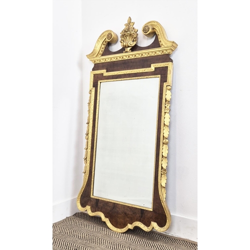 388 - WALL MIRROR, 19th century in George II style, walnut with gilt detail and bevelled plate, labeled T ... 