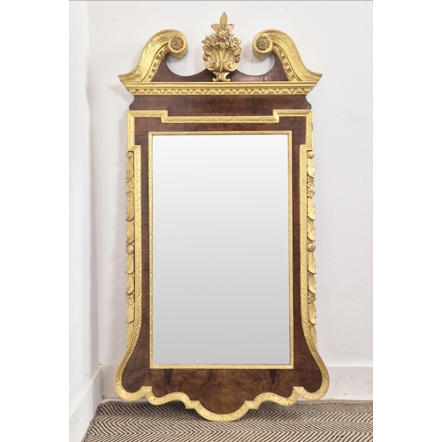 388 - WALL MIRROR, 19th century in George II style, walnut with gilt detail and bevelled plate, labeled T ... 