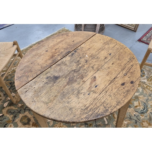 389 - CRICKET TABLE, 19th century pine, the circular top on tapering supports, 74cm H x 80cm D.