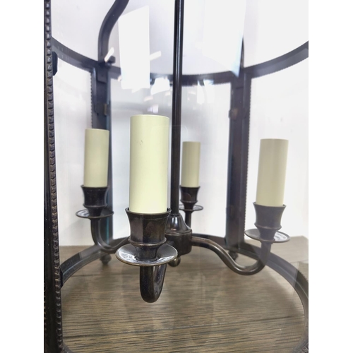 548 - CHARLES EDWARDS WHITEHALL LANTERNS, a pair, bronze and glass, 58cm H x 29cm D. (2)