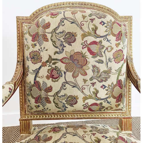 553 - FAUTEUILS, a pair, Napoleon III giltwood with floral patterned upholstery, 101cm H x 67cm W. (2)