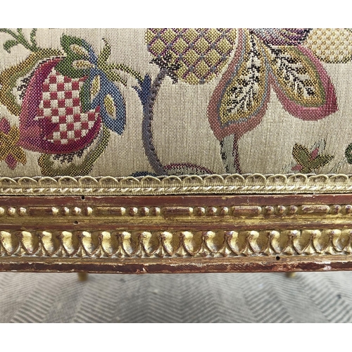 553 - FAUTEUILS, a pair, Napoleon III giltwood with floral patterned upholstery, 101cm H x 67cm W. (2)