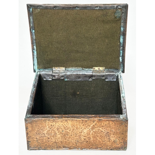 556 - SLIPPER  BOX, early 20th century Newlyn style hammered copper with sloping rising lid and baize inte... 