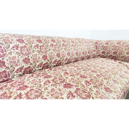 569 - CHESTERFIELD SOFA, Victorian mahogany and gilt heightened with floral patterned upholstery, 67cm H x... 