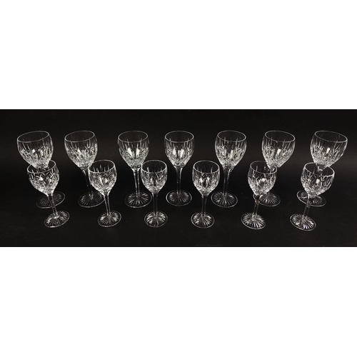 9 - STUART CUT CRYSTAL 'SHAFTESBURY' WINE GLASSES, a set of eight, a set of six smaller glasses and a de... 