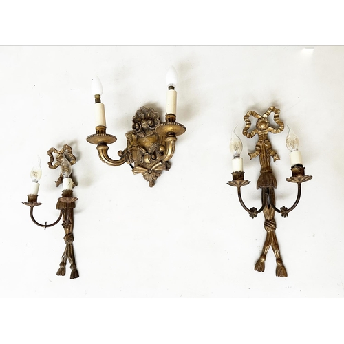 570 - WALL LIGHTS, a pair, carved giltwood each with bow crest and two branch candelabra, together with a ... 