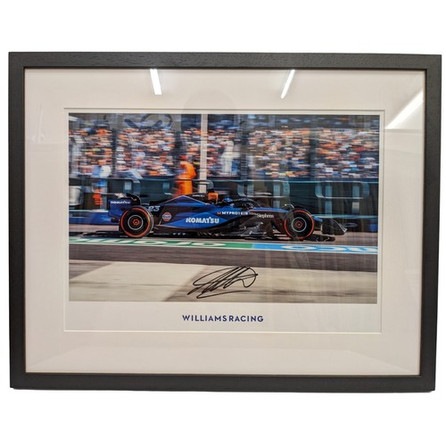 FORMULA 1 PHOTOGRAPH SIGNED BY ALEX ALBON, framed, donated by Williams Formula One Team.