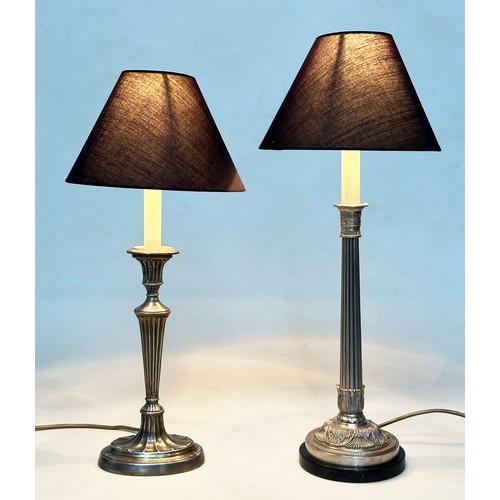 573 - TABLE LAMPS, silvered metal with reeded column together with another silvered metal and reeded colum... 