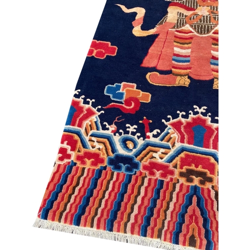 266 - CHINESE PICTORIAL RUG, 250cm x 124cm.