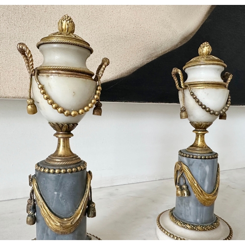 46 - ALABASTER URNS, a pair, 19th century alabaster, marble and ormolu mounted miniature urns on plinths,... 