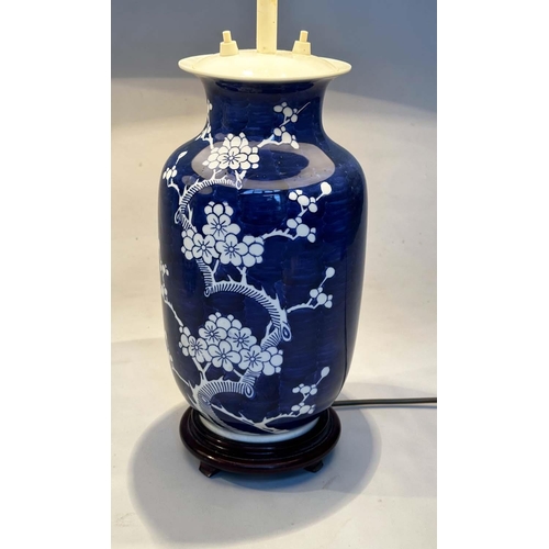 131 - TABLE LAMPS, two, comprising a Chinese blue and white ceramic vase form with striped shade and a vas... 