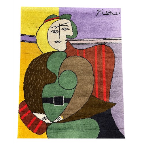 240B - PABLO PICASSO DESSO RUG, Femme assise dans un fauteuil rouge, edition 218/500, 115cm x 90cm.