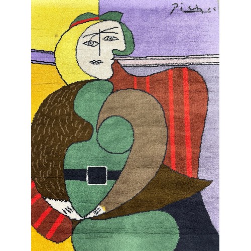 240B - PABLO PICASSO DESSO RUG, Femme assise dans un fauteuil rouge, edition 218/500, 115cm x 90cm.