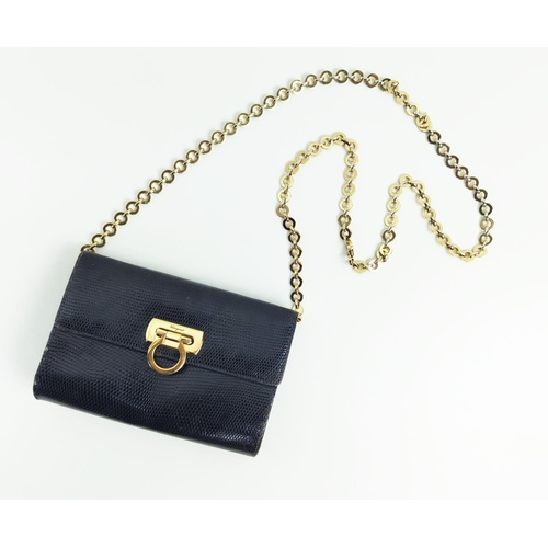 11 - SALVATORE FERRAGAMO VINTAGE SHOULDER BAG/CLUTCH, with gancini iconic front flap closure, black leath... 