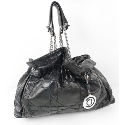 21 - CHRISTIAN DIOR LE TRENTE BAG BY JOHN GALLIANO, black cannage leather, cinched strap with buckle deta... 