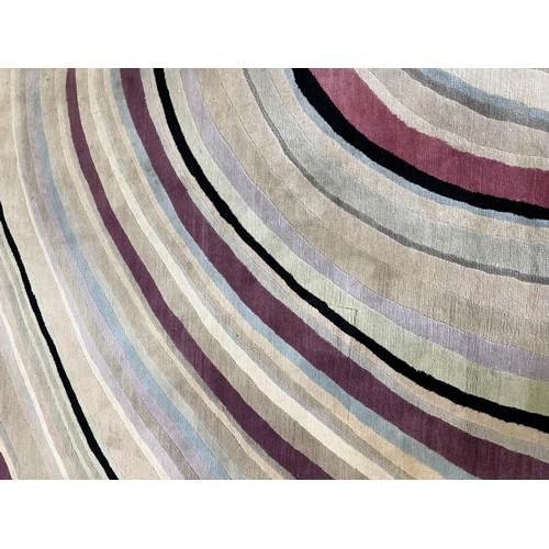 241 - THE RUG COMPANY CARPET, 302cm x 250cm, 'Swirl' designed by Paul Smith.