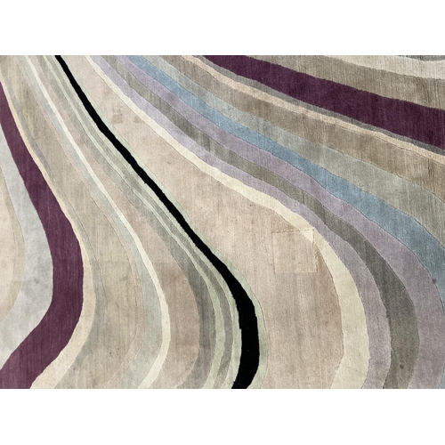 241 - THE RUG COMPANY CARPET, 302cm x 250cm, 'Swirl' designed by Paul Smith.