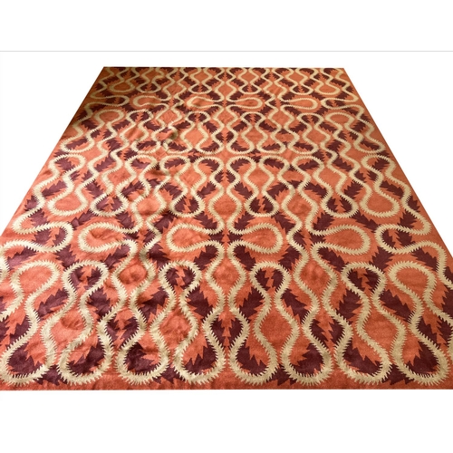 244 - THE RUG COMPANY CARPET, 370cm x 274cm, 'Squiggle Orange' designed by Vivienne Westwood.