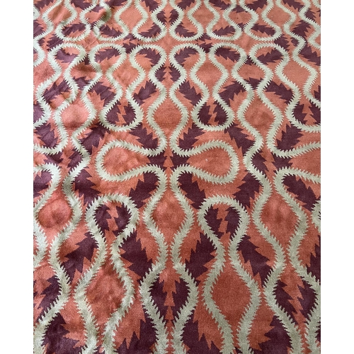 244 - THE RUG COMPANY CARPET, 370cm x 274cm, 'Squiggle Orange' designed by Vivienne Westwood.