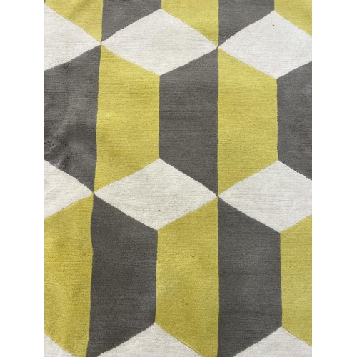 249 - THE RUG COMPANY CARPET, 365cm x 278cm, 'Chiesa yellow' designed by Suzanne Sharp.