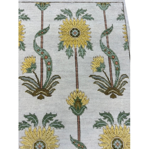 252 - CONTEMPORARY SUNFLOWER DESIGN CARPET, 302cm x 247cm.