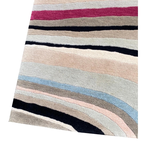 255 - THE RUG COMPANY CARPET, 184cm x 129cm, 'Swirl' designed by Paul Smith.