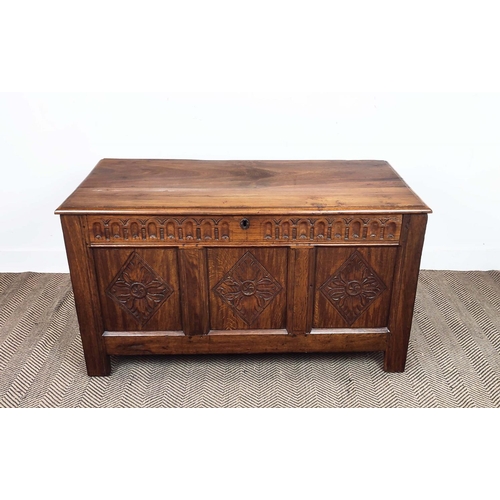 270 - COFFER, 17th century and later oak with a rising lid and carved panelled front, 57cm D x 70cm H x 12... 