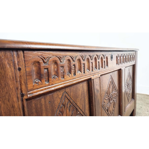 270 - COFFER, 17th century and later oak with a rising lid and carved panelled front, 57cm D x 70cm H x 12... 