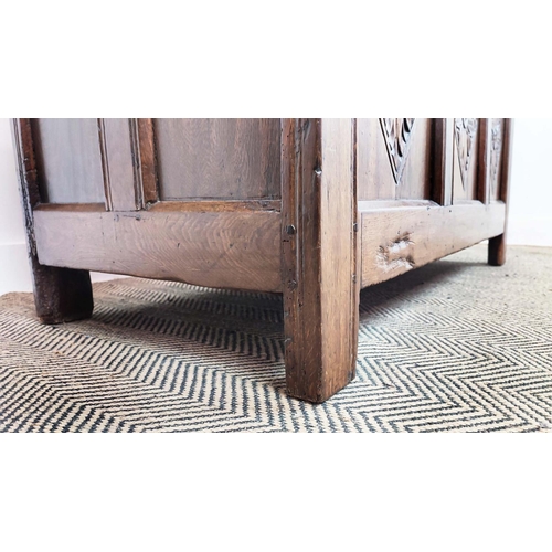 270 - COFFER, 17th century and later oak with a rising lid and carved panelled front, 57cm D x 70cm H x 12... 