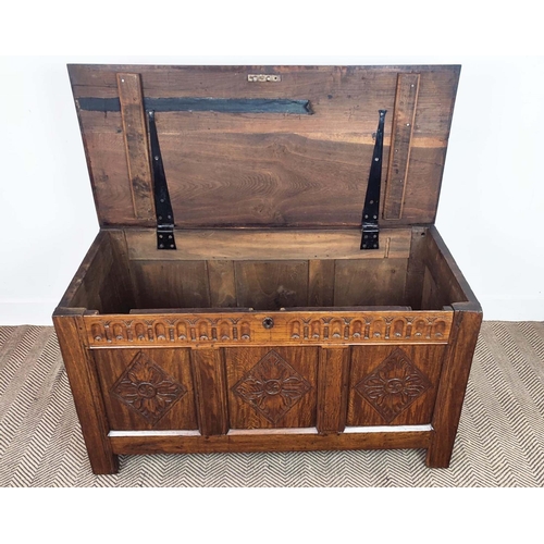 270 - COFFER, 17th century and later oak with a rising lid and carved panelled front, 57cm D x 70cm H x 12... 