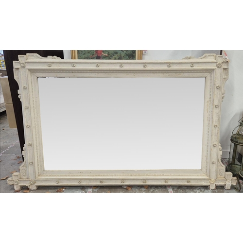 279 - WALL MIRROR, Victorian grey painted with rosette and cruciform cornered frame, 144cm H x 253cm.