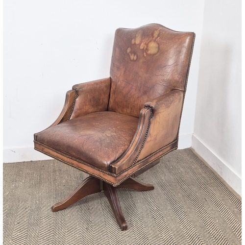 280 - DESK CHAIR, vintage tan leather with swivel and slightly reclining seat, 103cm H x 66cm W.