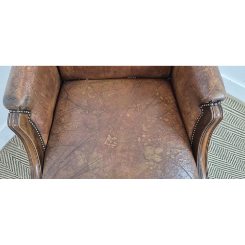 280 - DESK CHAIR, vintage tan leather with swivel and slightly reclining seat, 103cm H x 66cm W.