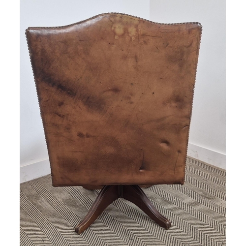 280 - DESK CHAIR, vintage tan leather with swivel and slightly reclining seat, 103cm H x 66cm W.