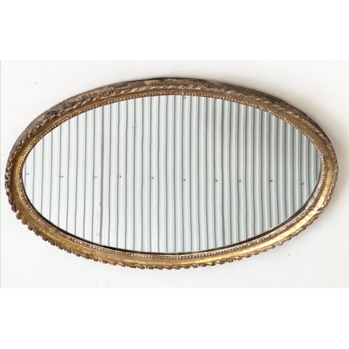 288 - WALL MIRROR, George III giltwood with oval carved and beaded frame, 66cm H x 46cm.