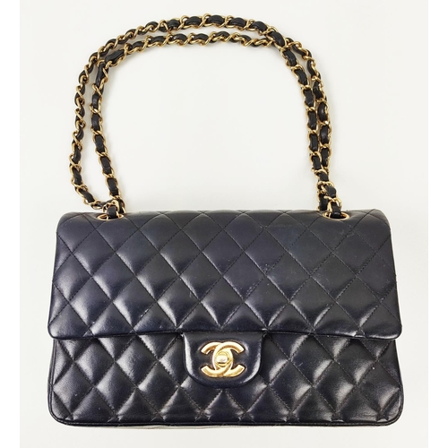 29 - CHANEL CLASSIC DOUBLE FLAP BAG, with black quilted lambskin, 2010-11 serial sticker 14890452, gold t... 