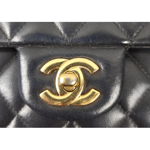 29 - CHANEL CLASSIC DOUBLE FLAP BAG, with black quilted lambskin, 2010-11 serial sticker 14890452, gold t... 