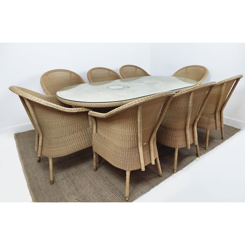 353 - LLOYD LOOM GARDEN DINING TABLE, 100cm D x 200cm L, and eight chairs, bears plaques. (9)