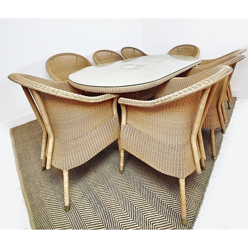 353 - LLOYD LOOM GARDEN DINING TABLE, 100cm D x 200cm L, and eight chairs, bears plaques. (9)