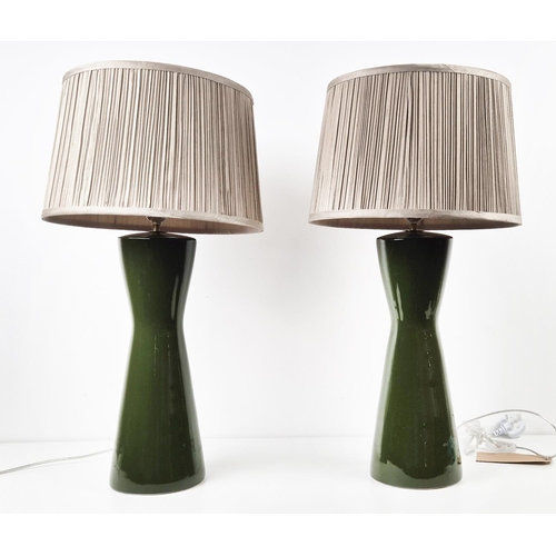 422 - TABLE LAMPS, a pair, glazed green ceramic, with shades, 66cm H approx. (2)