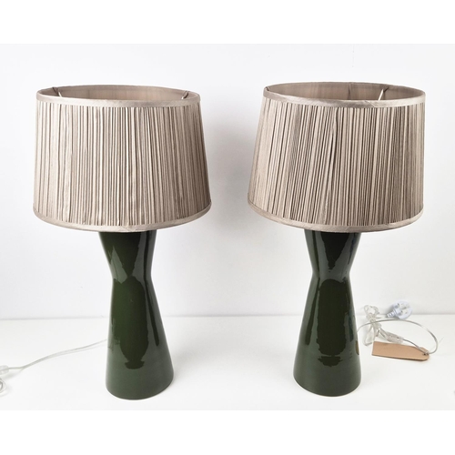 422 - TABLE LAMPS, a pair, glazed green ceramic, with shades, 66cm H approx. (2)