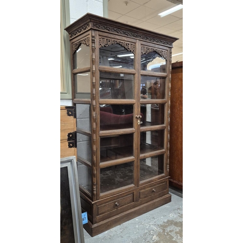 461 - THIA GLAZED CARVED TEAK CABINET, 100cm W x 171cm H x 45cm D.